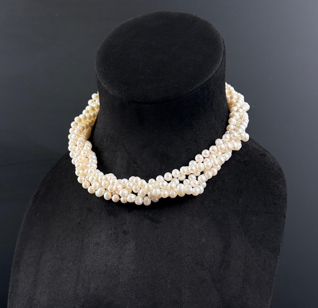 Sterling Silver Triple Strand Pearl Necklace: 7 7/8" long as shown. 112 grams total weight.