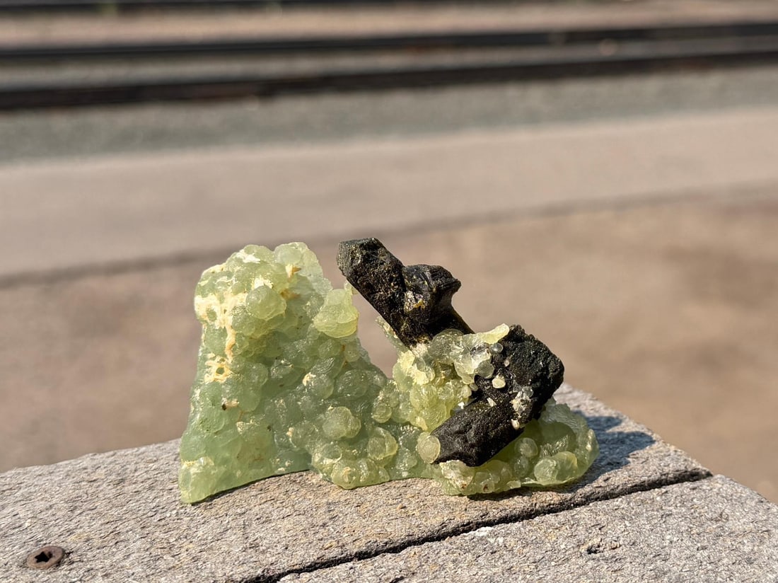 Green Prehnite Specimen with Epidote Crystals: Likely from the Kayes Region in Mali, Africa. 1 1/4" by 2" by 3 1/2". 102 grams.