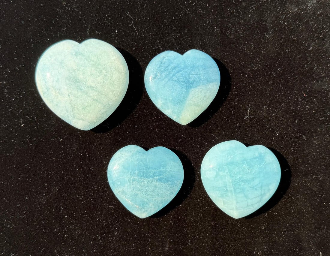 Group of Carved Amazonite Hearts: Nice grouping. 198 grams total.