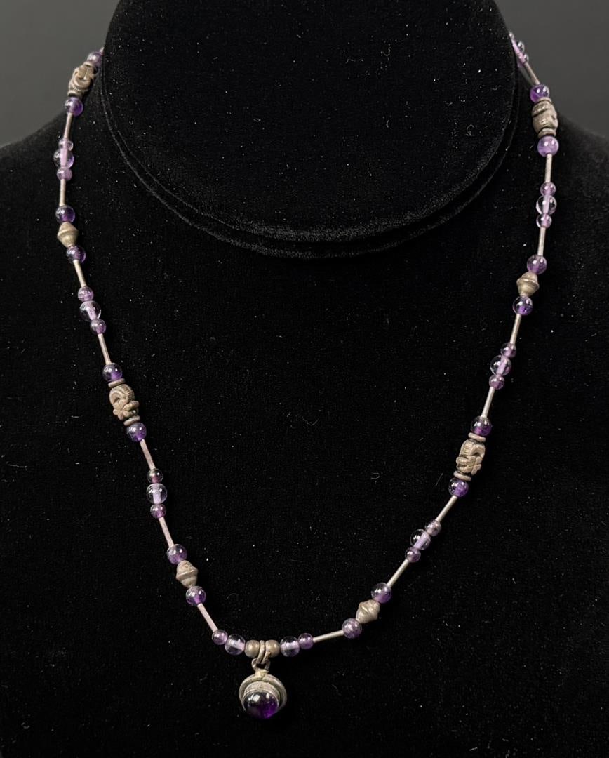 Sterling Silver Amethyst Necklace: 6 1/2" long as shown, 9.16 grams.