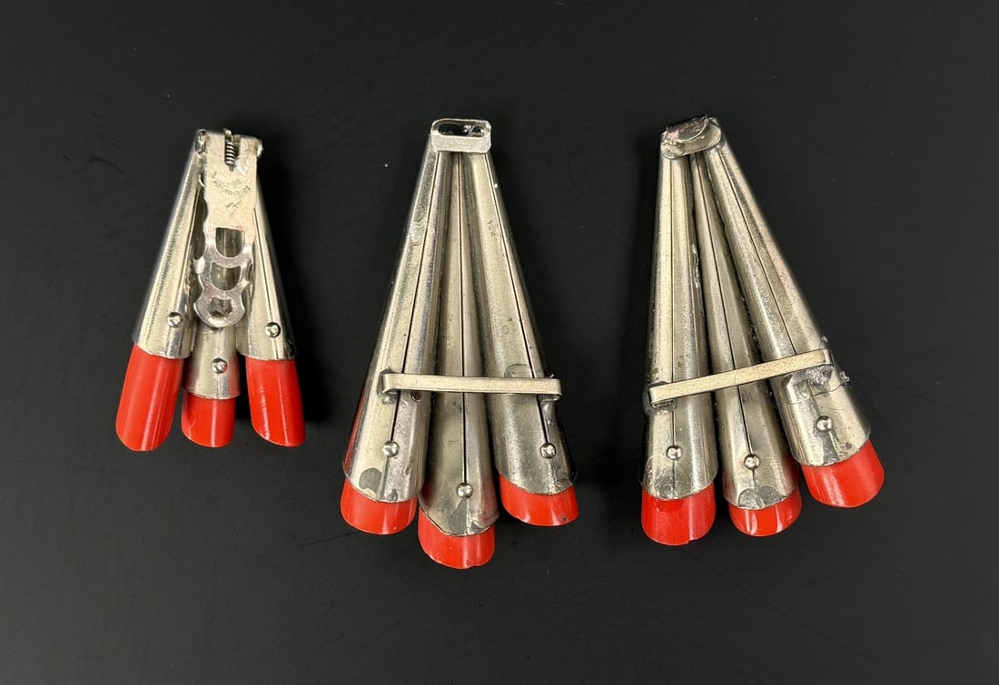 Collection of Art Deco Bakelite Fur Clips: The largest one is 2 1/2" long.