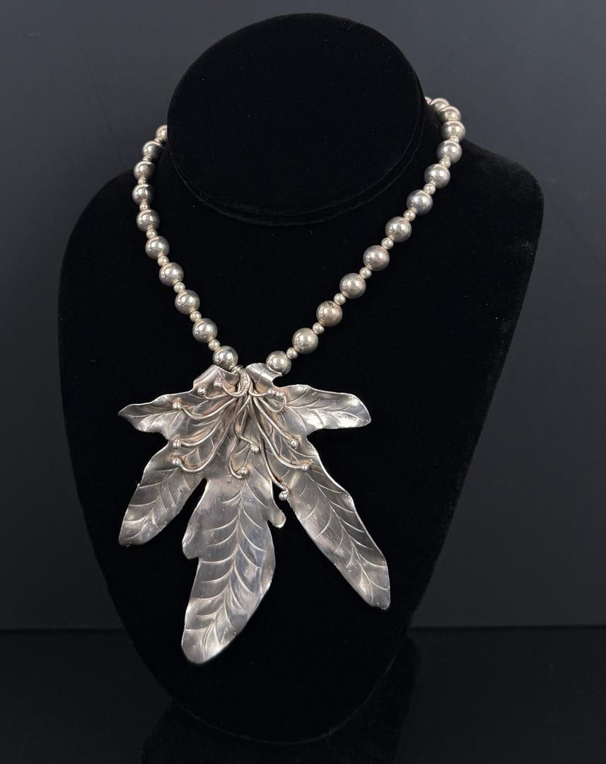 South Pacific Sterling Silver Flower Necklace: 12 1/2" long as displayed. 71.78 grams total.