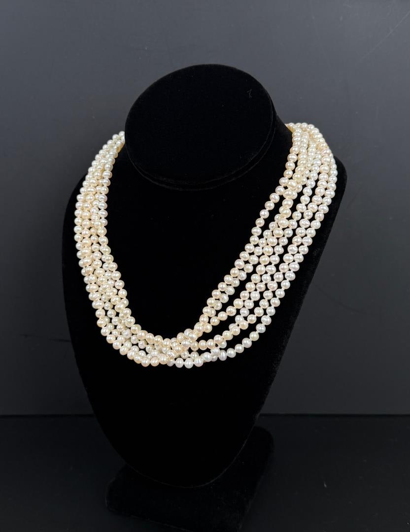 Sterling Silver Pearl Multi Strand Necklace: 9 7/8" long as shown. 169.6 grams.