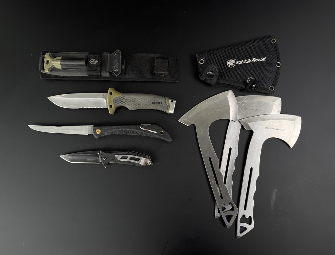 Collection of Gerber Kershaw Normark Smith Knives: Knives and throwing axes.