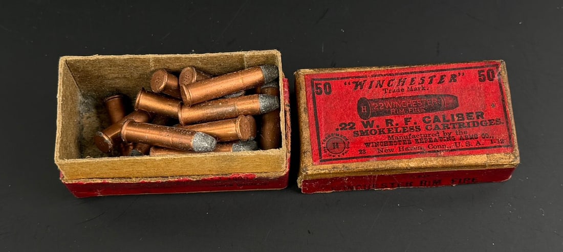Winchester .22 WRF Smokeless 1890 Cartridge Box: 21 cartridges total. Copper cased cartridges, California and New York Shipments Requires this lot to be sent to an FFL Dealer.