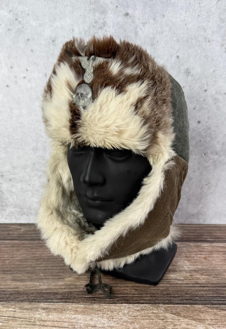 WW2 German Eastern Front Rabbit Pelzmutze Hat: Insignia may be post war. Hat dated 1944.