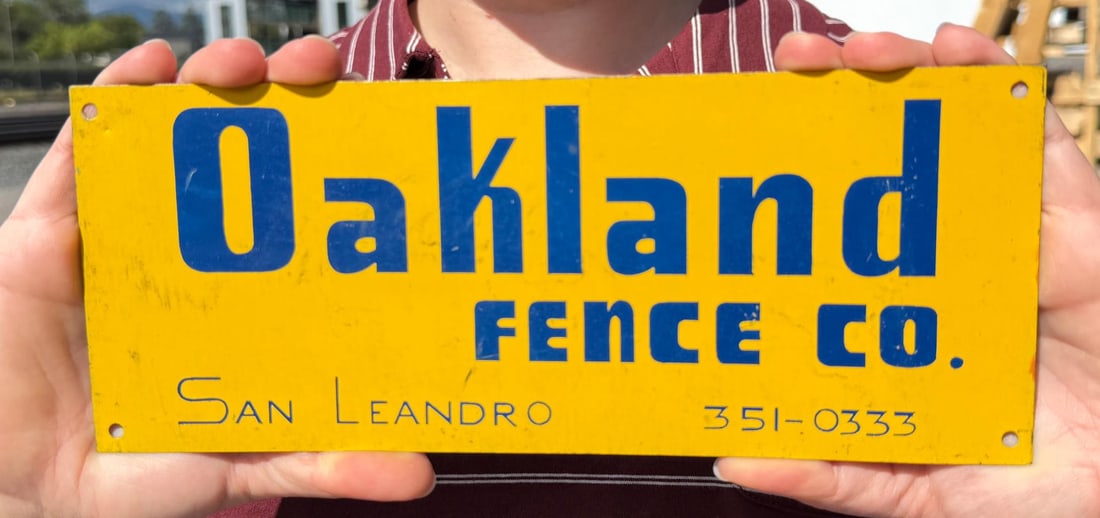 Oakland Fence San Leandro California Sign: 4 1/4" by 10" wide.
