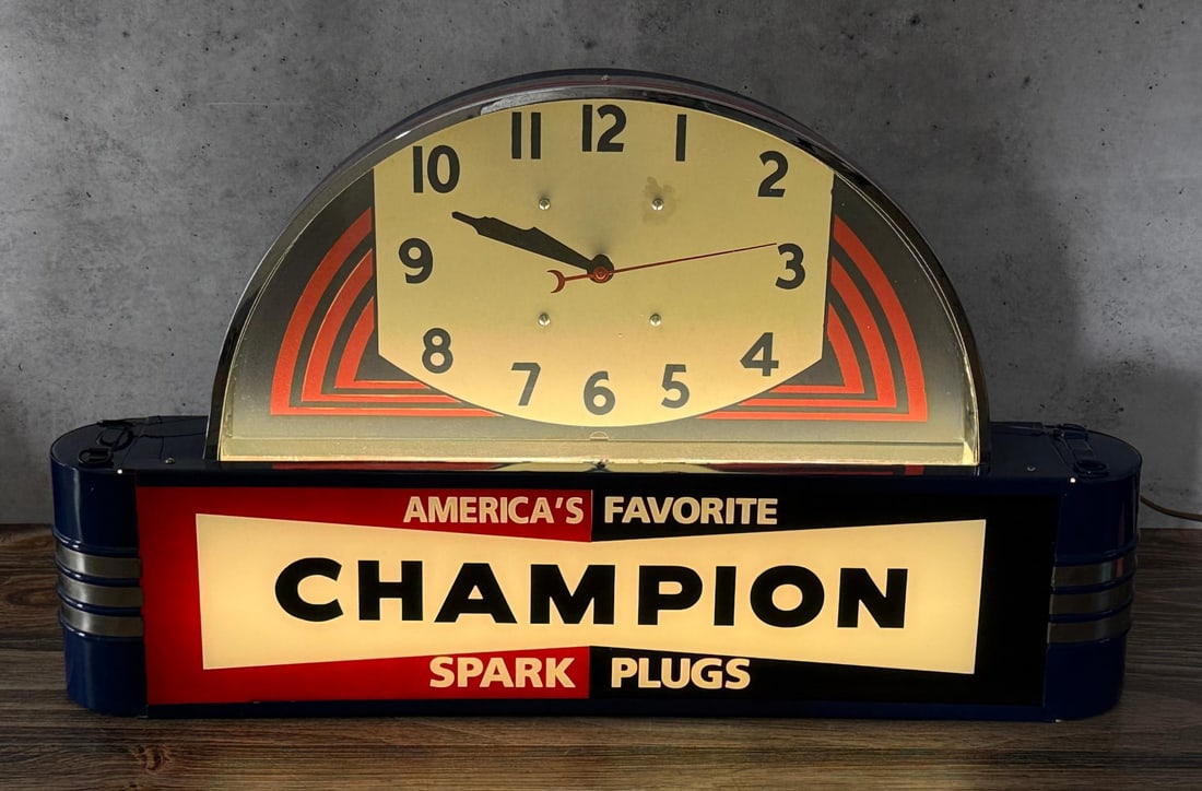 Champion Spark Plugs Lighted Clock Sign: Working Condition. 26 1/8" by 15 1/4" by 7 5/8".