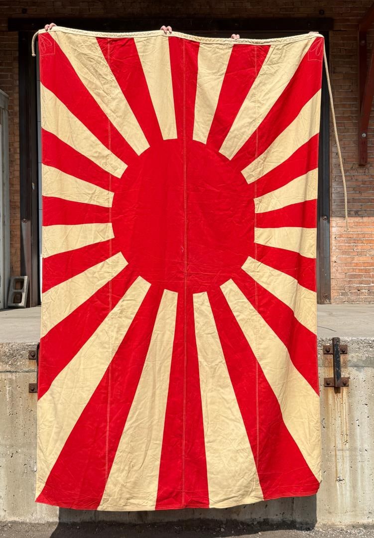 WW2 Japanese Captured Rising Sun Battle Flag: 68 5/8" by 104 1/2". Captured at Battle of Cebu by Harold Miller of Great Falls Montana, USMC. The Battle for Cebu City was a major engagement of World War II that occurred between March 26 and April 