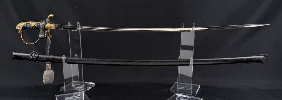 WW2 German Heer Army Lion Head Sword: Sword is 38" long. Very nice example with knot. Clemen & Jung