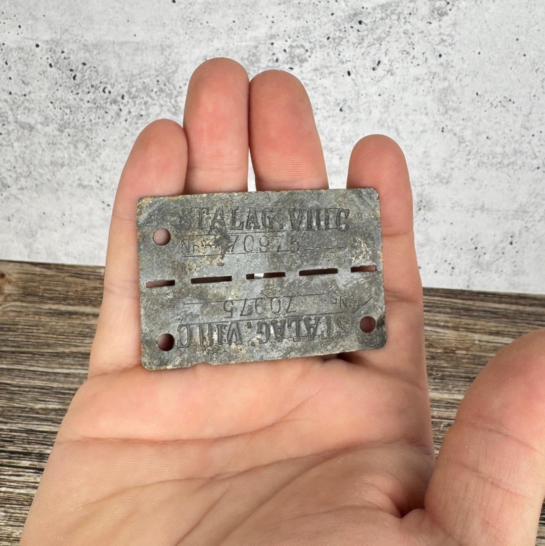 WW2 German Frontstalag Prisoner of War Dog Tag: Was glued into a display, residue on back.