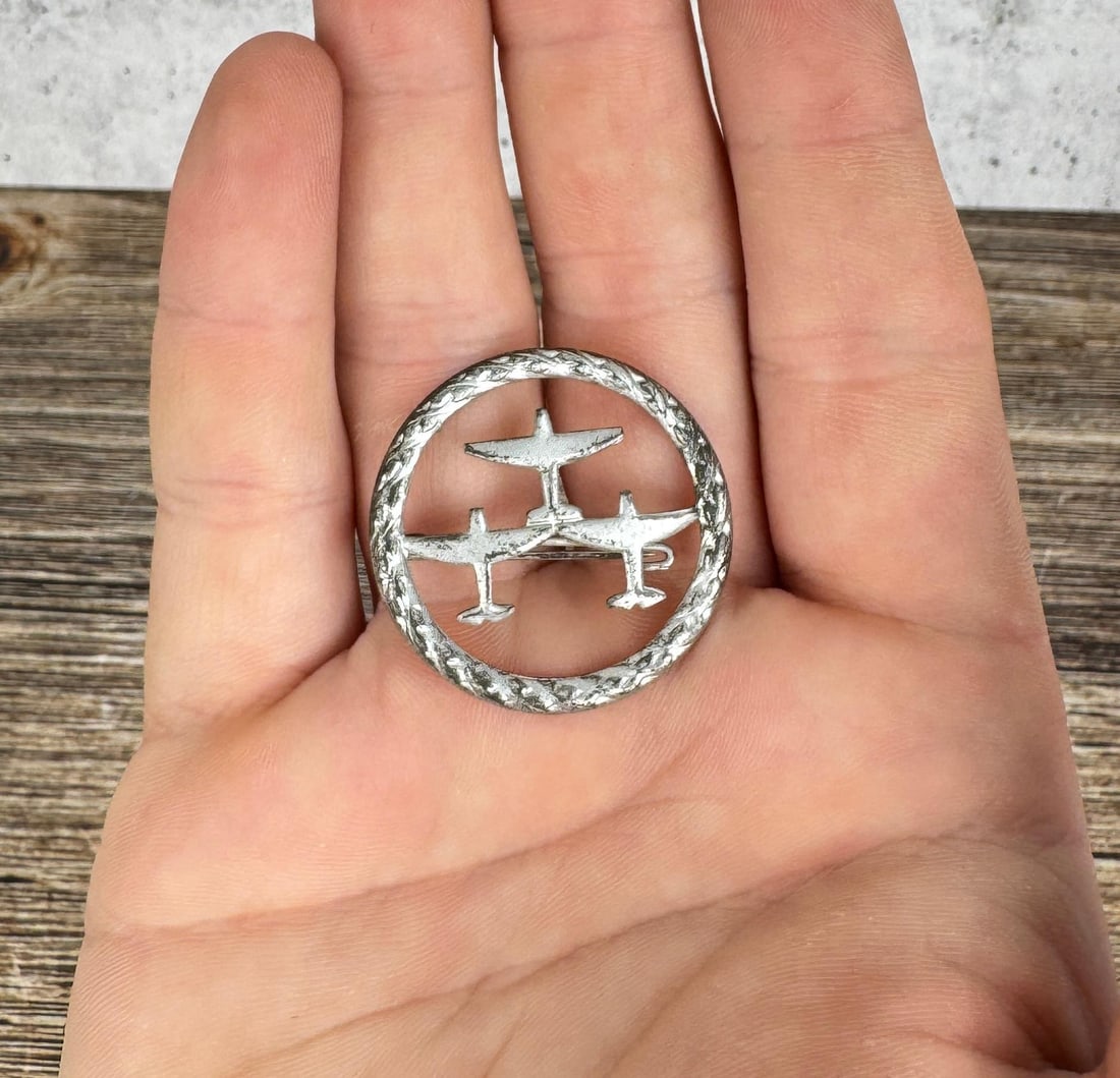 WW2 German DLV Winter Relief Tinnie Badge: 1 1/4" diameter.