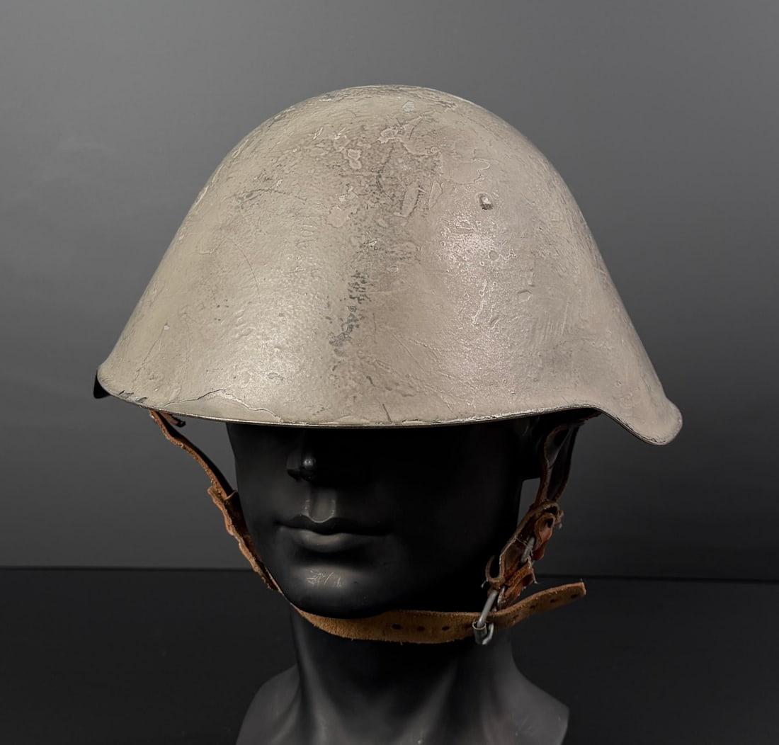 East German NVA M56/76 Helmet: Nice example with chinstrap and liner.