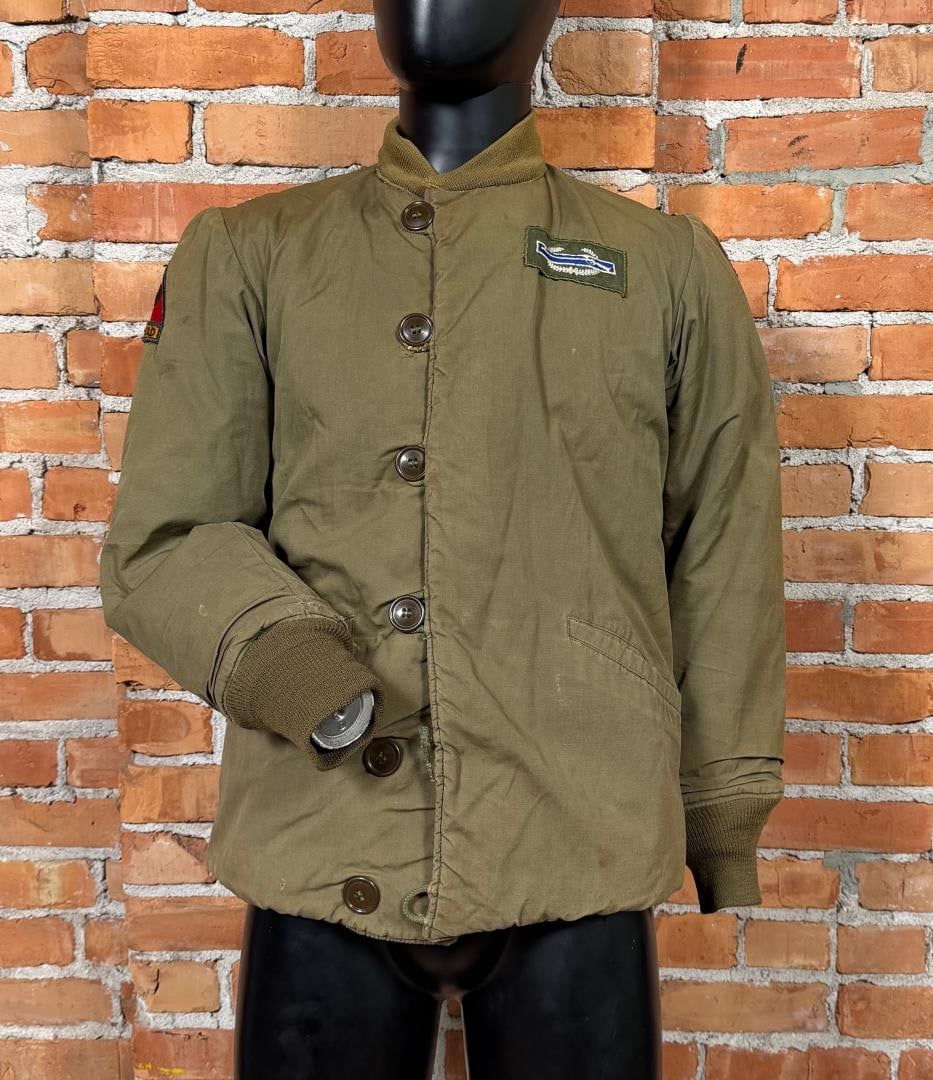 Named WW2 US Army M43 Field Jacket Pile Liner: Size 38R. Stenciled Curtright on the inside of the jacket. Complete with 3rd Armored Division Spearhead Patch and Combat Infantryman Badge on the chest.