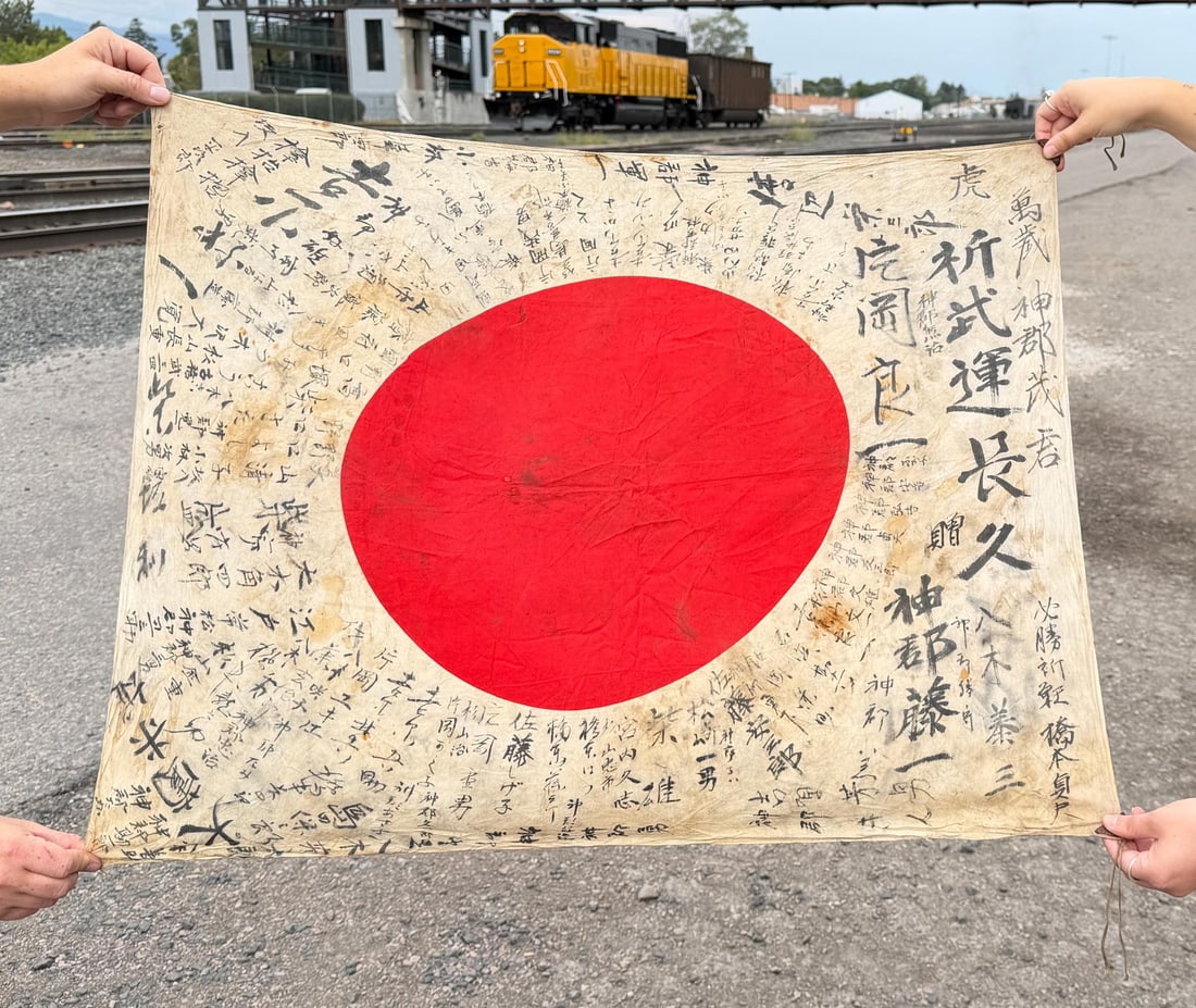 WW2 Japanese Captured Meatball Hinomaru Flag: Nice example with clear characters and some light staining. Measures 28" by 35".