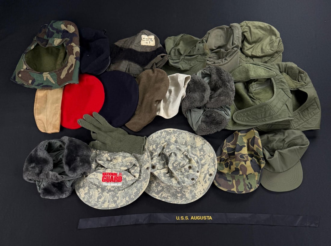 Collection of US Army Surplus Hats: 19 hats, 1 glove and one hat tally.