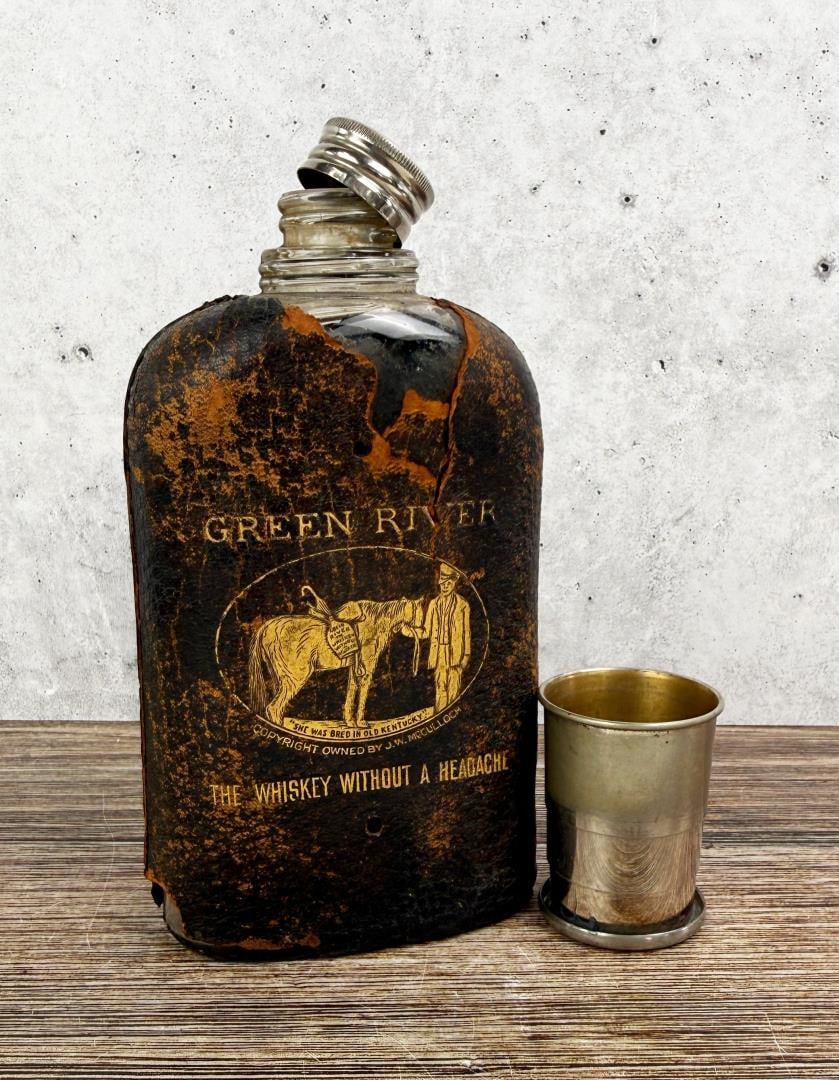Green River Whiskey Leather Pocket Flask Bottle: Sold with accompanying telescoping shot glass.