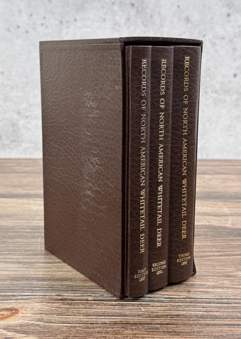 Records of North American Whitetail Deer Signed: Copyright by the Boone and Crockett Club. Includes the First Edition from 1987, Second Edition from 1991, and Third Edition from 1995. Signed by James Duke , Walter White, William Nesbitt and Jack Ren