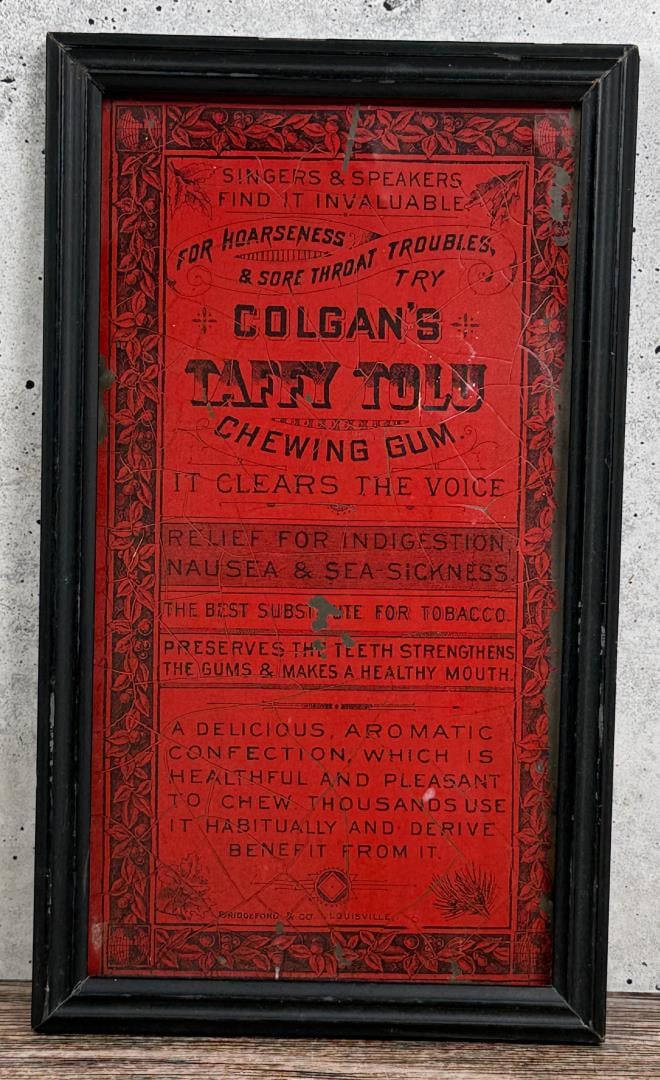 Colgan?s Taffy Tolu Chewing Gum Sign: 5 1/4" by 8 7/8" framed. Made from the side of a tin.