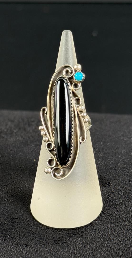 Navajo Sterling Silver Onyx Turquoise Ring: 5.99 grams. Size 5 3/4.