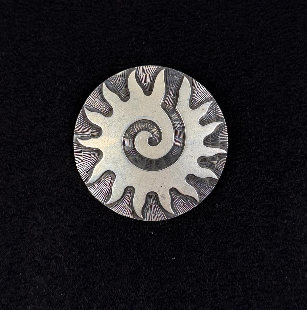 Ernesto Ocampo Sterling Silver Sunburst Brooch: 29.15 grams. 2" diameter.