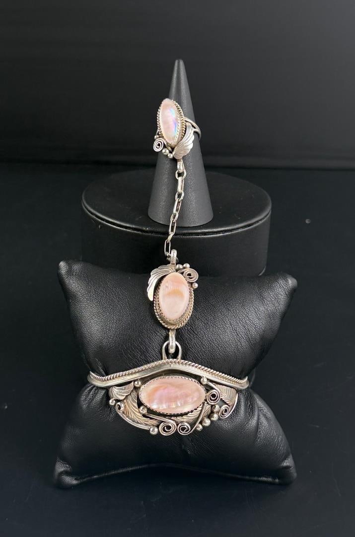 Navajo Sterling Mother of Pearl Slave Bracelet: Bracelet is 5 1/4" inner circumference. Ring Size 6. 28.94 grams.