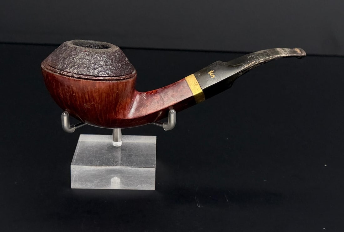 Stanwell Rhodesian Briar Estate Tobacco Pipe: Sandblasted and smooth squat bulldog shape. Handmade in Denmark. Measures 6" long.