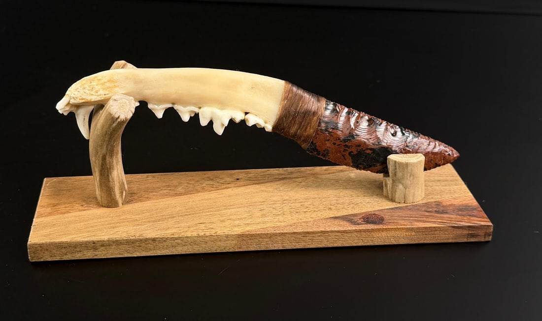 Bo Earls Handmade Jaw Handle Knife: Handmade by Bo Earls. Bo is one of the finest modern flint and obsidian knappers. His knives are some of the nicest money can buy. The handle is whitetail deer horn. 7 5/8" long.