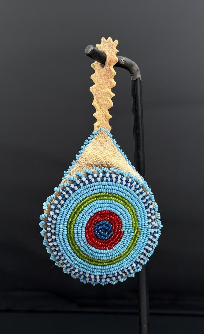 Montana Blackfoot Indian Beaded Watch Pouch: As used with pocket watches, loop was attached to coat button. 4 5/8" by 2 3/4" as displayed. First Quarter of the 20th Century.