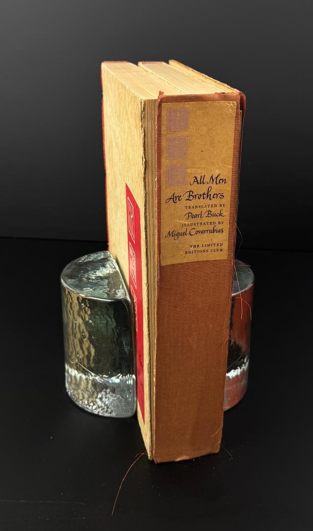 All Men are Brothers: Shui Hu Chuan. Limited Editions Club. Volumes 1 & 2. 1948. Volume 2 is in fairly rough shape.