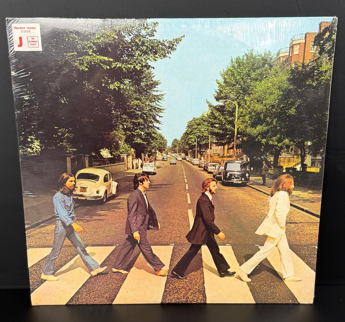 The Beatles Abbey Road 33 LP Record Sealed SO-383: Factory Sealed with Record Hunter Code J Hype Sticker. Revised non sewer grate cover.