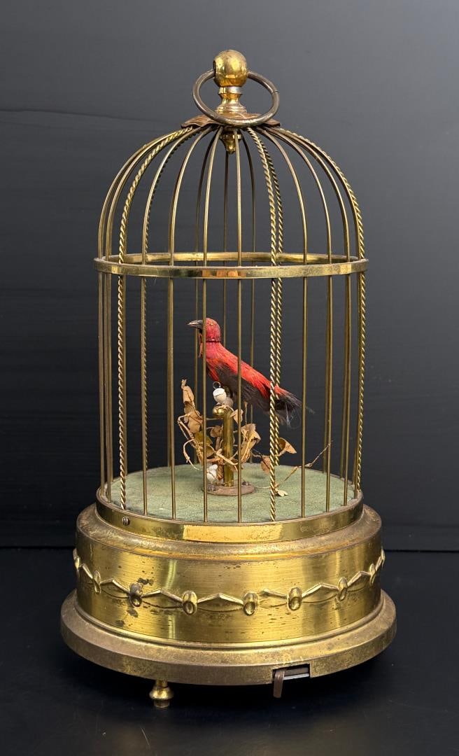 Karl Griesbaum Automaton Singing Birdcage: 11 1/8" tall, 6 3/8" diameter. In working condition.