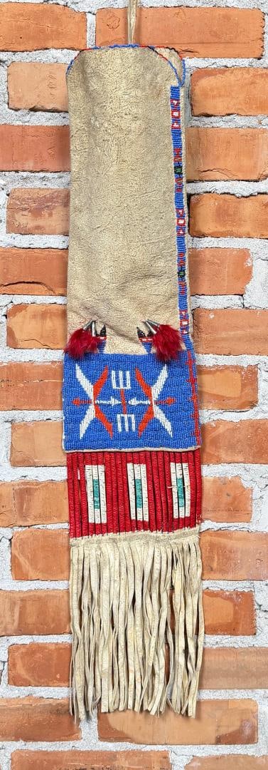 Crow Indian Quilled & Beaded Pipe Bag Wool Tassels: 32 3/4" long. First Quarter of the 20th Century. Provenance: Includes original collection note stating date of acquisition as 3/11/1950 and history.