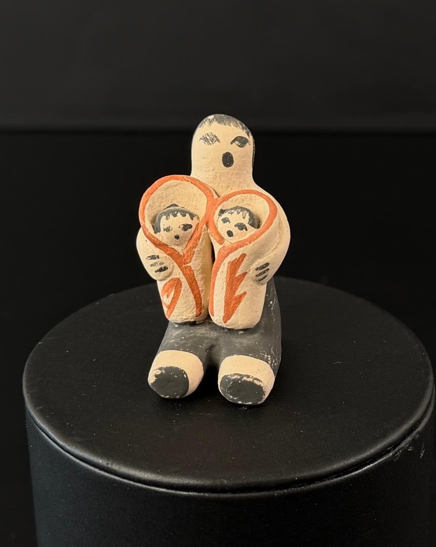 Cochiti Pueblo Pottery Storyteller: 1 3/4" by 1 1/4" by 1 1/8"
