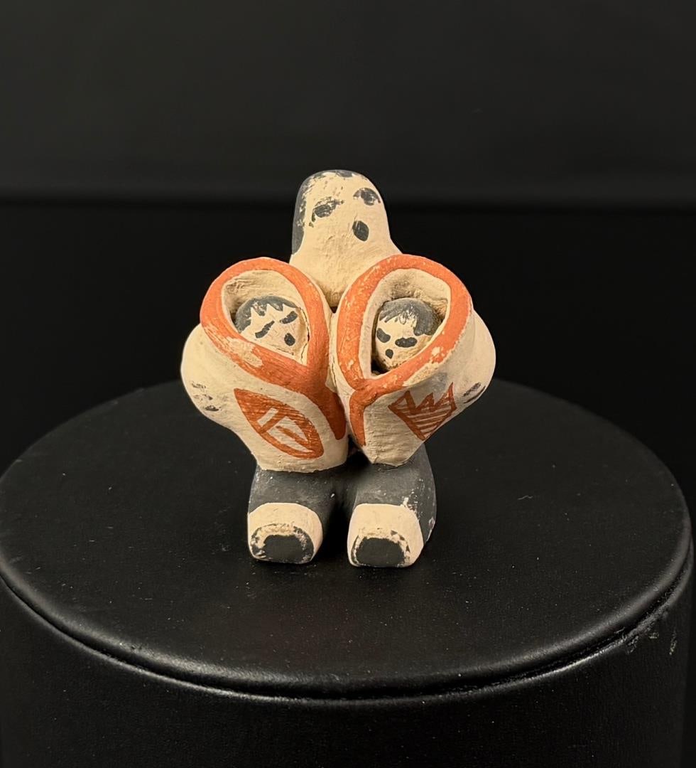 Cochiti Pueblo Pottery Storyteller: 1 1/2" by 1 3/8" by 1"