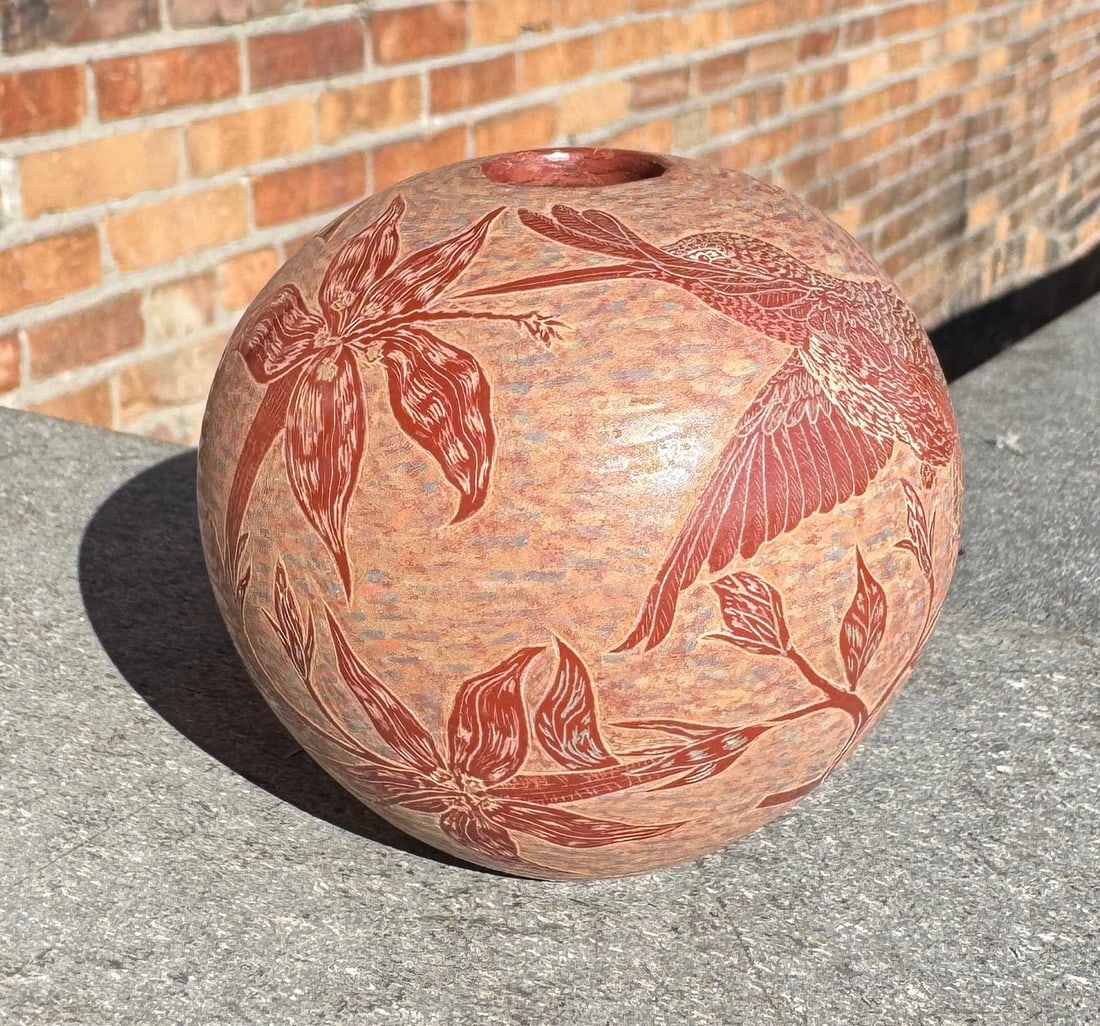 Joseph Lonewolf Santa Clara Pueblo Hummingbird Pot: 3" diameter, 2 3/4" tall. Joseph Lonewolf. 1932 - 2014. Known for: Sgrafitto Carved Pottery. Joseph Lonewolf (January 26, 1932 ? November 9, 2014) was a Native American potter from Santa Clara Pueblo,