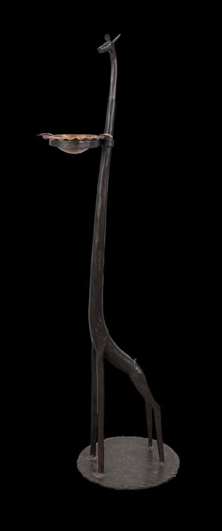 Mary Colter Molesworth Cast Iron Giraffe Ashtray: Title is Giraffe Ashtray. These were made via a collaborative effort between Thomas Molesworth and Mary Colter. 7 1/2" by 7 7/8" by 31 1/4". Mary Elizabeth Jane Colter (April 4, 1869 Pittsburgh, Penns