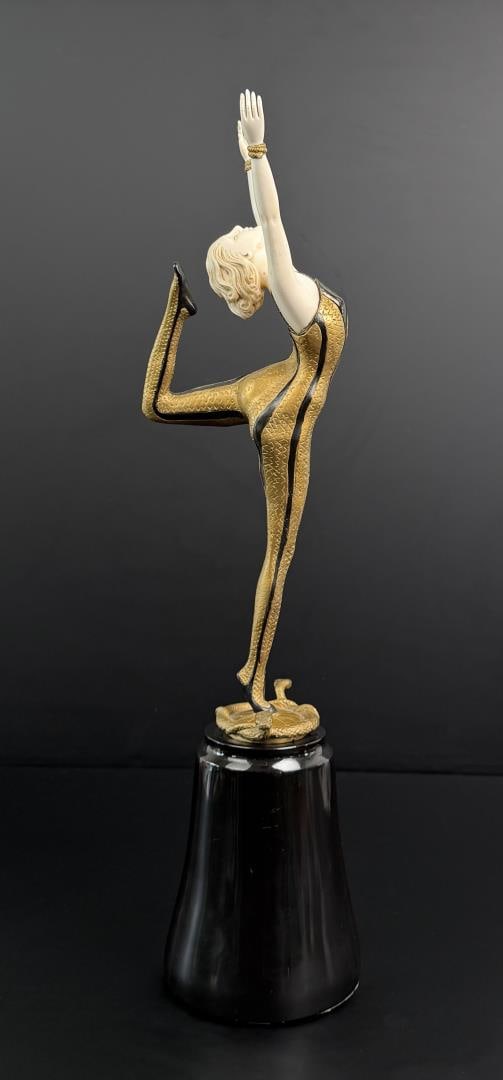 Otto Poertzel The Snake Dancer Bronze: Title is The Snake Dancer. 21 1/2" by 5 1/4" by 4 7/8". Otto Poertzel. 1876 Scheibe in Thuringen, Germany - 1963 Coburg, Germany. Known for: Elongated dance figure sculpture of bronze, ivory and porce