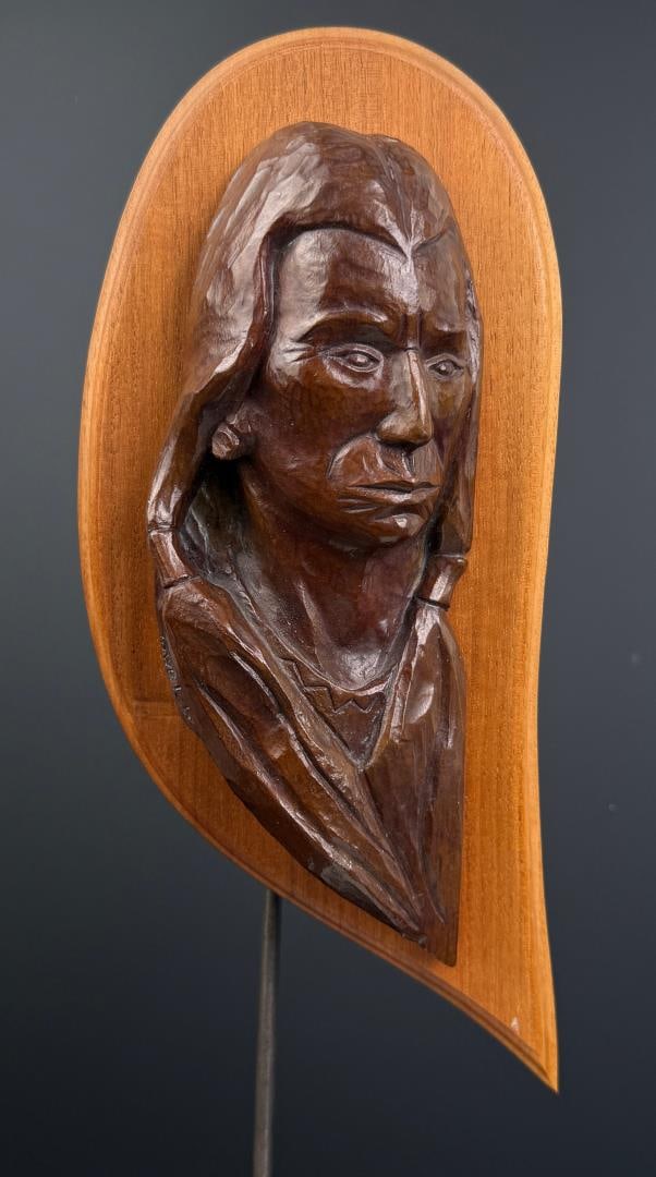 Ace Powell Blackfoot Indian Bronze Plaque: Title is Blackfoot Indian. 1951. 2 7/8" by 5 7/8" by 12 7/8". Marked Rex E. Breneman, 1971. Ace (Asa Lynn) Powell (1912 - 1978) was active/lived in Montana, New Mexico. Ace Powell is known for Cowboy 