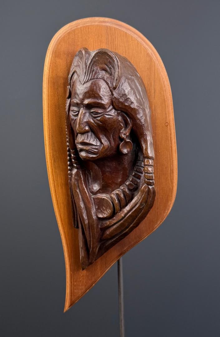 Ace Powell Indian Chief Bronze Plaque: Title is Indian Chief. 1951. 2 7/8" by 5 7/8" by 13 1/4". Marked Rex E. Breneman, 1971. Ace (Asa Lynn) Powell (1912 - 1978) was active/lived in Montana, New Mexico. Ace Powell is known for Cowboy genr