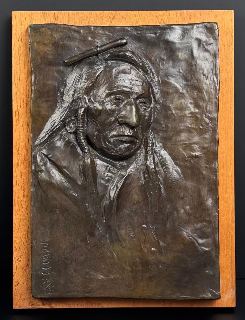 Ace Powell Indian Chief Wall Plaque Bronze: Title is Indian Chief. 2 1/4" by 9" by 12". Edition 32 of 35. Ace (Asa Lynn) Powell (1912 - 1978) was active/lived in Montana, New Mexico. Ace Powell is known for Cowboy genre and Indian figure painti