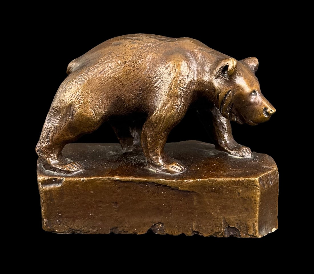 John Louis Clarke Small Rambling Bear Bronze: Title is Small Rambling Bear. 3 1/2" by 2 5/8" by 1 3/4". John Louis (Cutapuis) Clarke (1881 - 1970) was active/lived in Montana, Wisconsin. John Clarke is known for Wildlife wood carving-panels, Indi