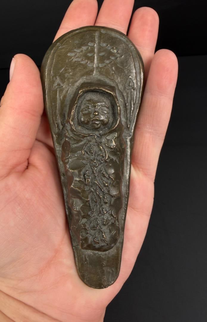 Charles M Russell Baby Cradleboard Bronze: Attributed to Charles CM Russell. Bronze is not signed. Was purchased many years ago for $3600. 4 7/8" by 2" by 7/8". Charles Marion Russell (1864 - 1926) was active/lived in Montana, California,
