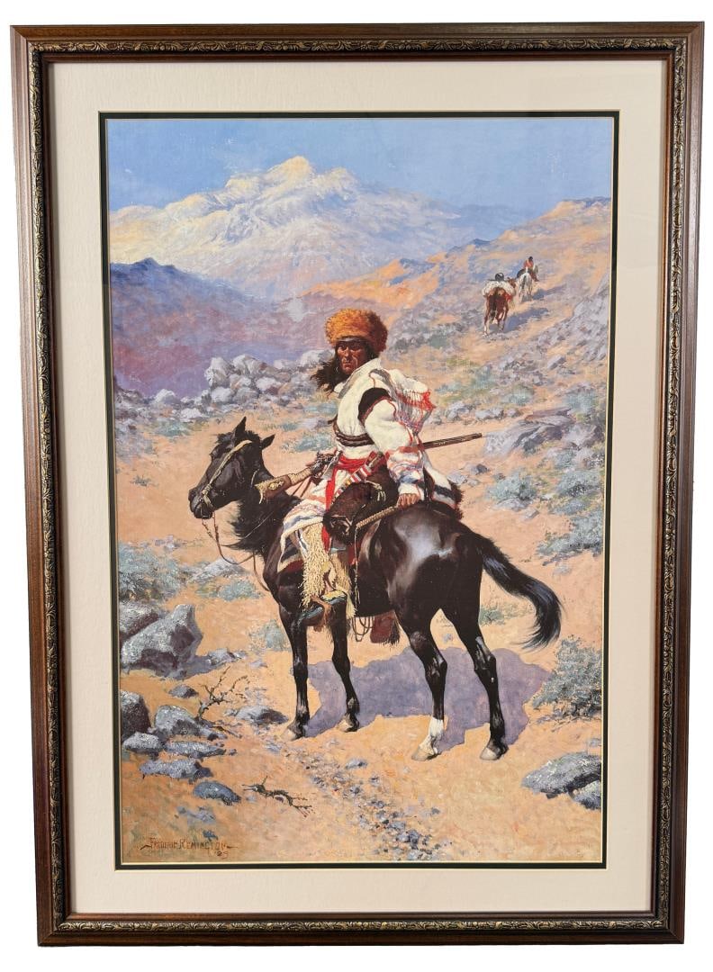 Frederic Remington An Indian Trapper Lithograph: 26 1/2" by 36 1/2" framed.