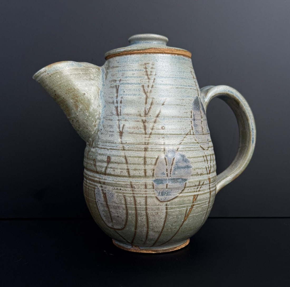 Frances Senska Montana Studio Pottery Teapot: Spout is chipped. 8" by 8" by 5 1/2". Frances Senska (1914 - 2009) was active/lived in Montana. Frances Senska is known for Pottery, ceramics, printmaker.