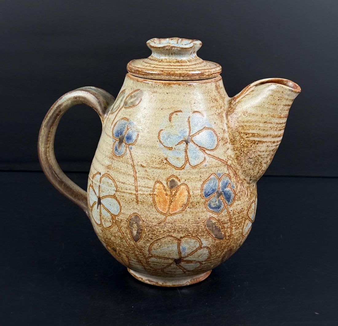 Frances Senska Montana Studio Pottery Teapot: Teapot is cracked and lid is broken and repaired. 6 3/4" by 6 1/8" by 5" Frances Senska (1914 - 2009) was active/lived in Montana. Frances Senska is known for Pottery, ceramics, printmaker.