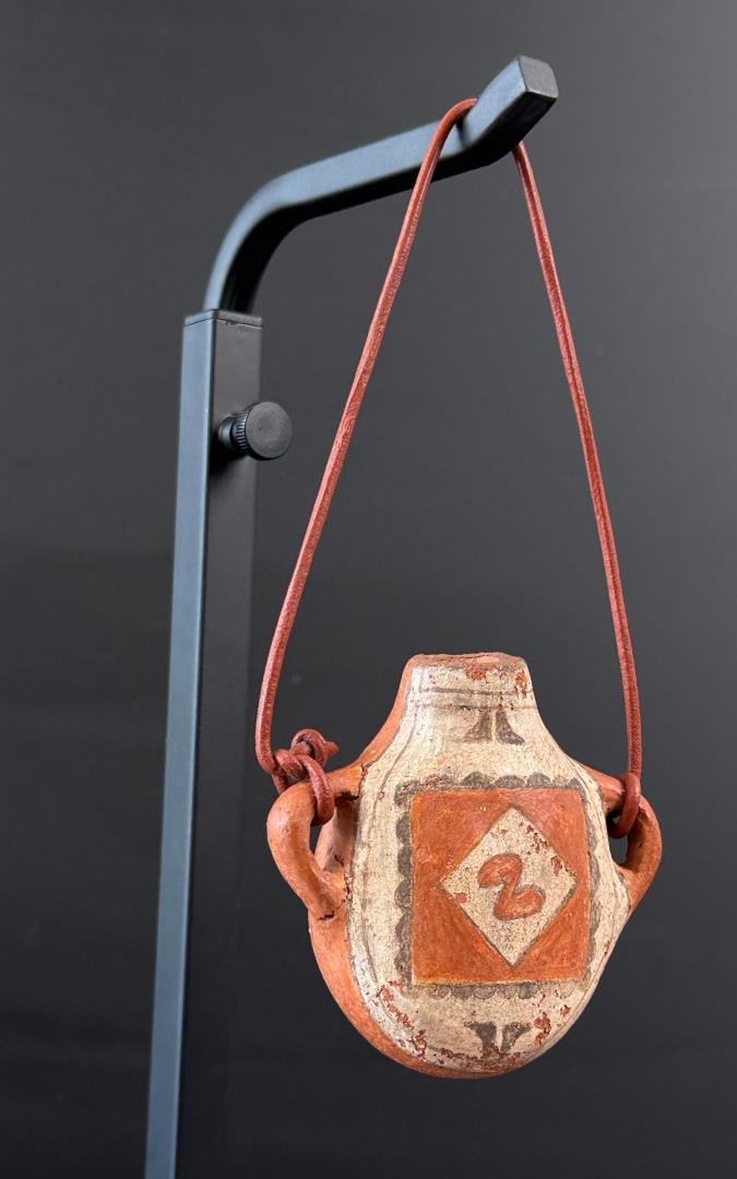 Eudora Montoya Santa Ana Pueblo Pottery Canteen: 5 1/2" by 3 1/2" by 1 1/4" as displayed.