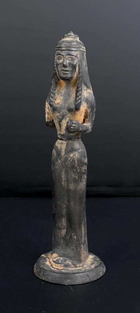 Egyptian Blown Glass Artemis Statuette: 10 1/8" tall, 3 1/8" diameter. Multiple areas of restoration. Unknown date of creation but has age. Provenance: From the estate of Andrew Cunningham Ware. Andrew Cunningham Ware Collection