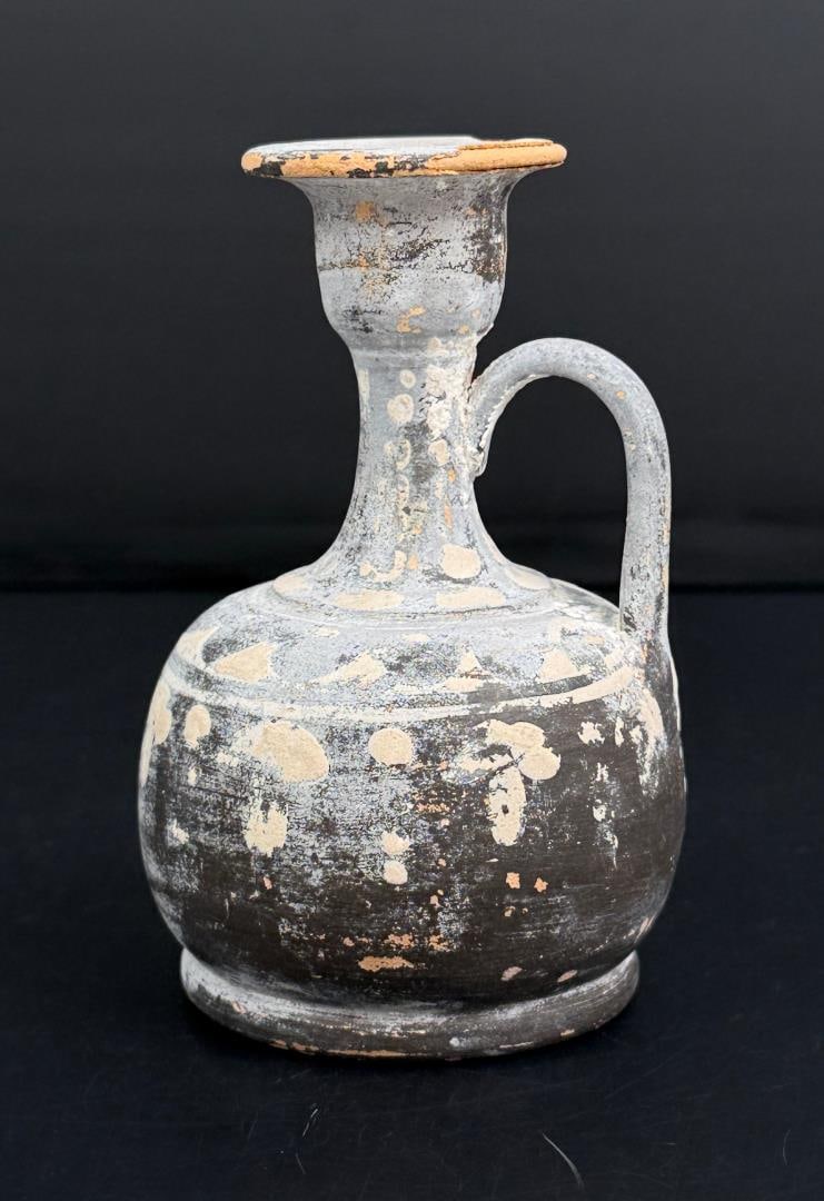 Ancient Greek Gnathian Ware Terracotta Lekythos: 4 1/2" tall, 2 7/8" diameter. Circa 4th Century BC. Provenance: Iris Cornelia Love Collection (1933-2020), New York, primarily formed in the 1950s-1970s. Iris Cornelia Love (1933?2020) was an