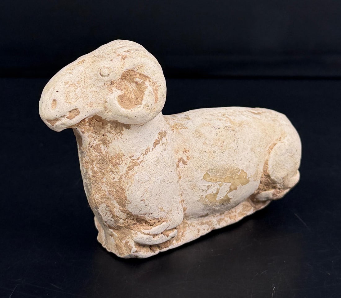 Chinese Tang Dynasty Terracotta Recumbent Ram: 4 1/2" by 2 7/8" by 1 1/2". Provenance: Ex. Private Rhode Island Collection, Acquired at Ancient Objects (Auction), RI, September 2016